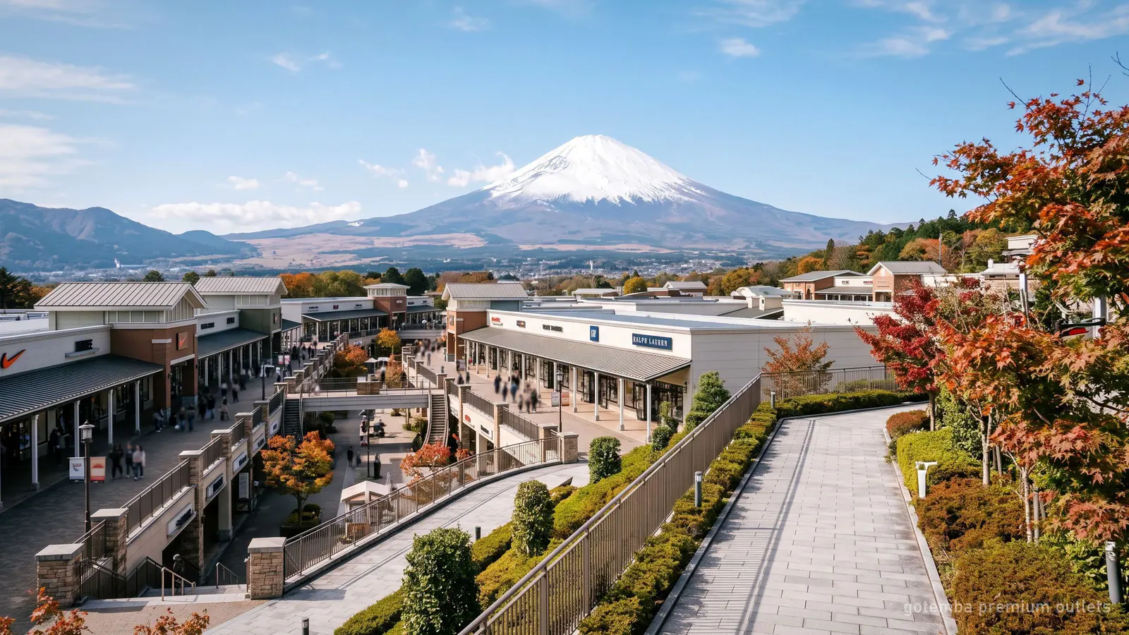 Open-air outlet shops at Gotemba Premium Outlets with Mount Fuji visible in the distance